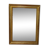 Empire period mirror, early nineteenth in gilded stucco wood H 72 cm