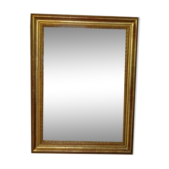 Miroir d'époque Empire début XIXème en bois stuqué doré H 72 cm