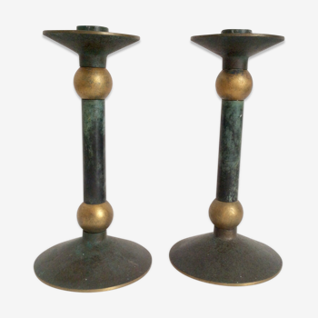Pair of patinated bronze candlesticks
