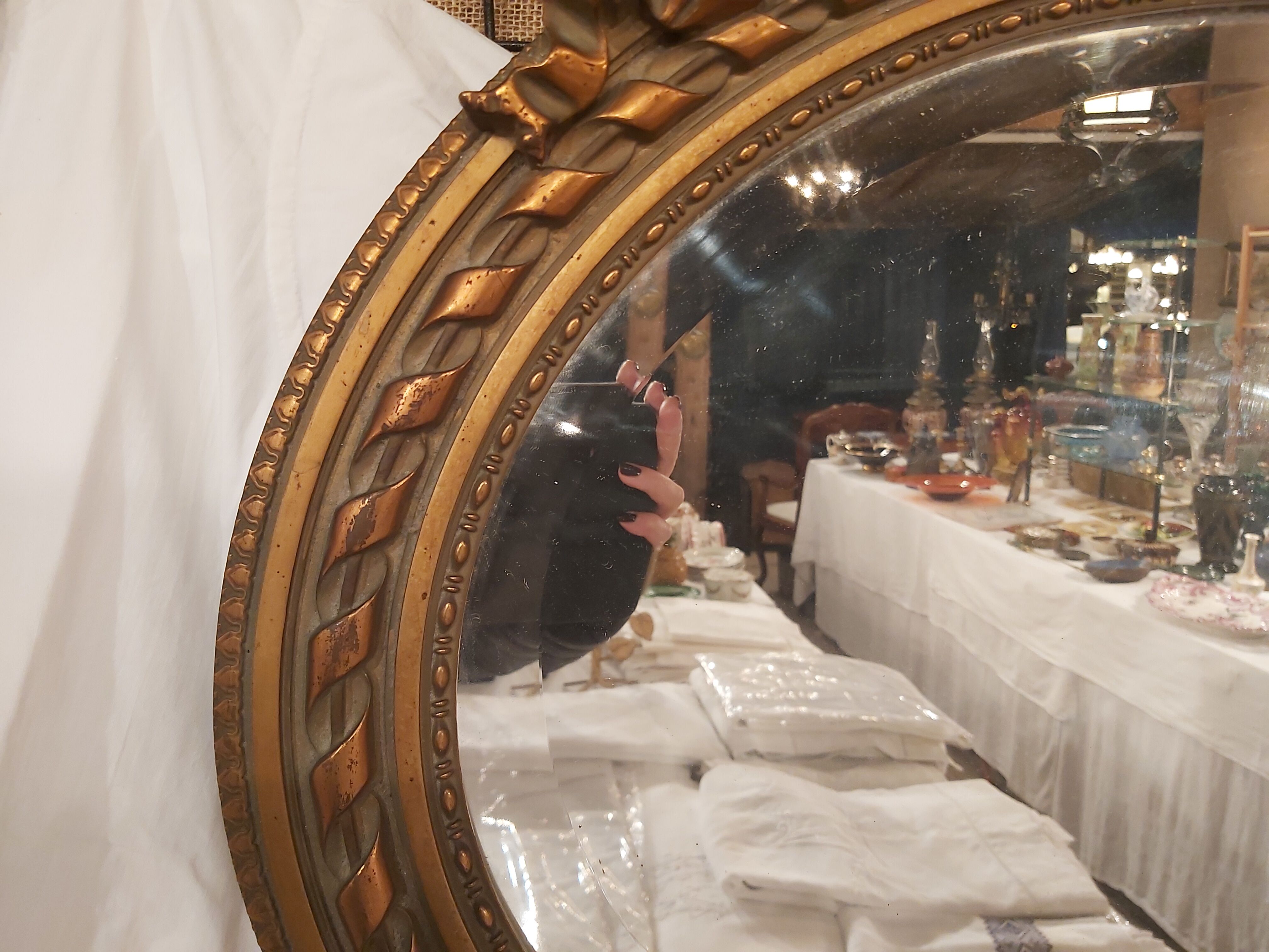 Louis XVI style oval beveled mirror