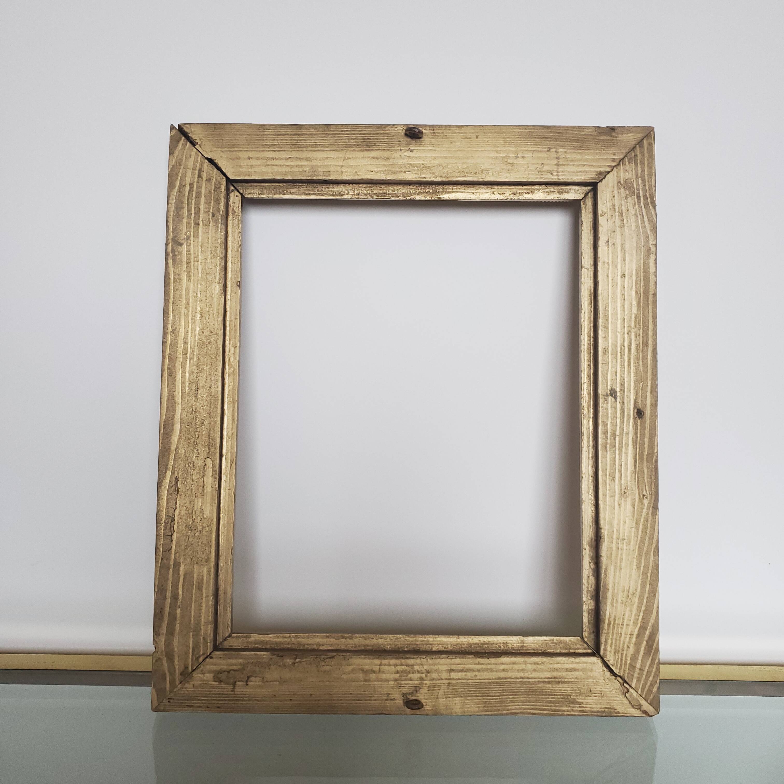 Old gilded carved wooden frame