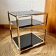 Gold metal side table, in the style of Maison Jansen, 1970s.