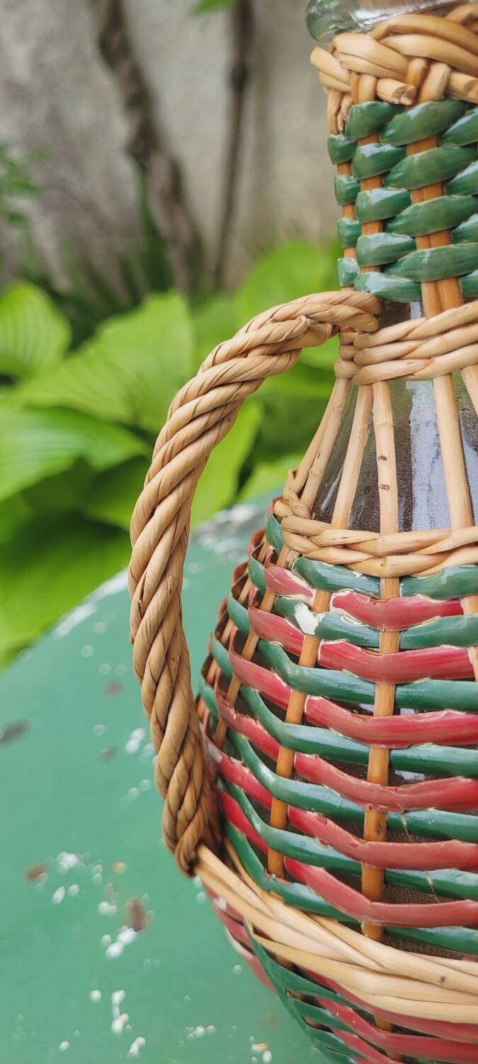 Glass and rattan carafe