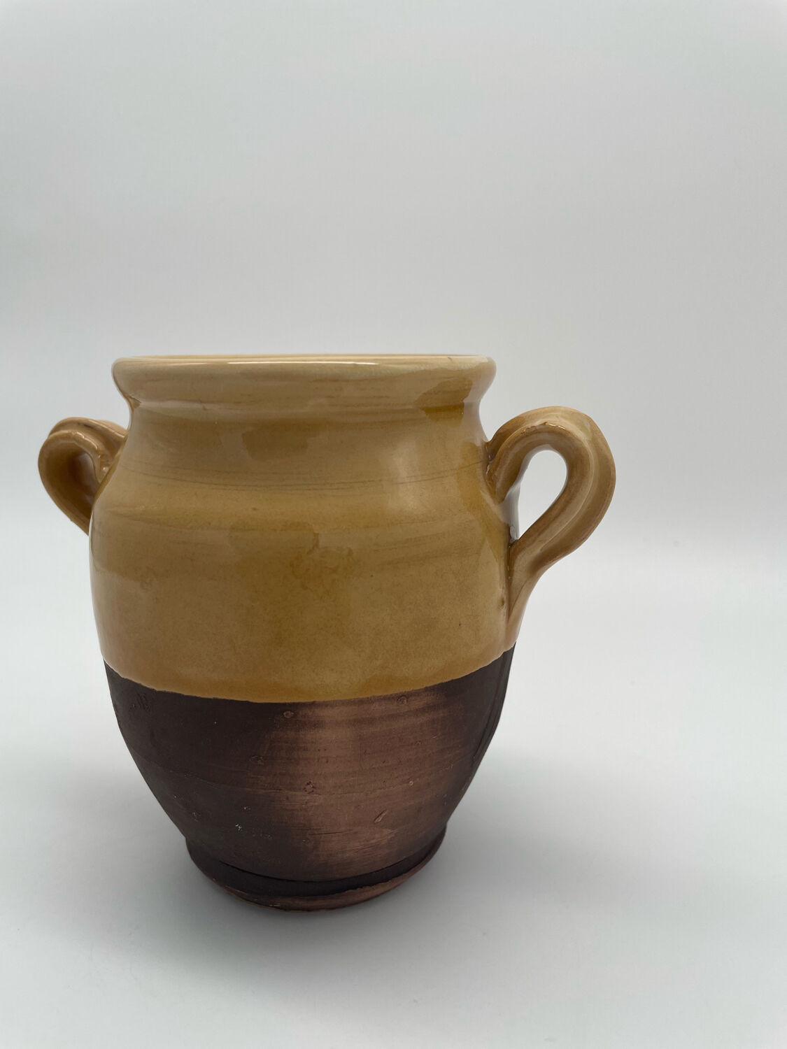 Varnished yellow terracotta confit pot