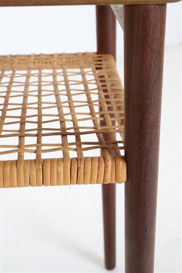 Rare set of three teak nesting tables with cane magazine rack / side tables / mid-century Danish modern design / 1950s / 1960s