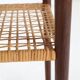 Rare set of three teak nesting tables with cane magazine rack / side tables / mid-century Danish modern design / 1950s / 1960s