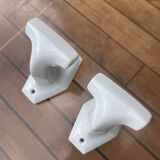 Duo of porcelain hooks