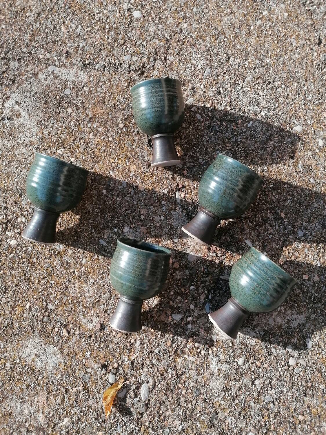 Original signed stoneware tumbler cups.