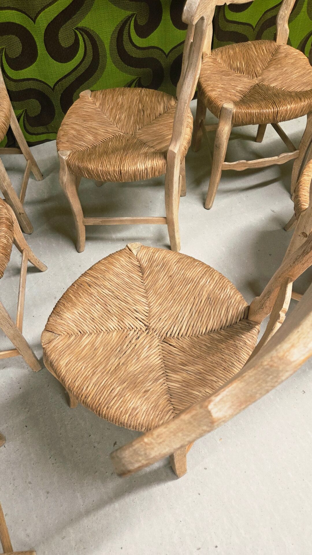 8 rustic oak chairs with patina, straw seating, 1950s.