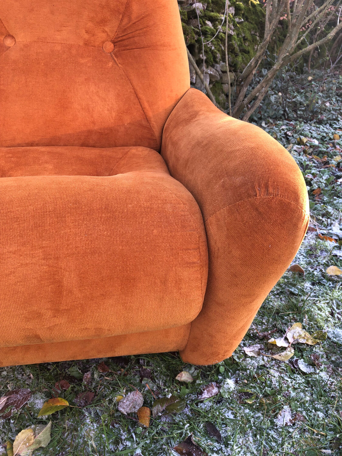 Orange velvet armchair