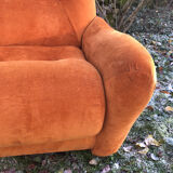 Orange velvet armchair