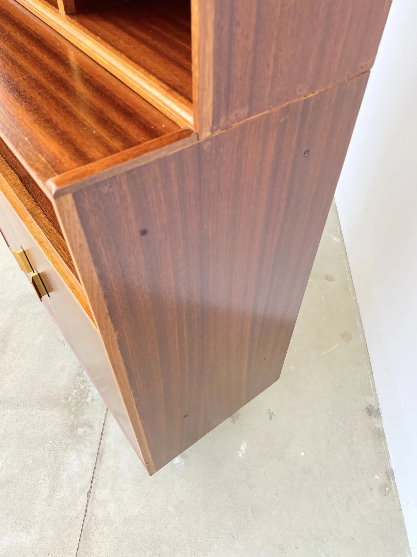 Mahogany library — closed storage and open cubbies, custom-made, 1960s.
