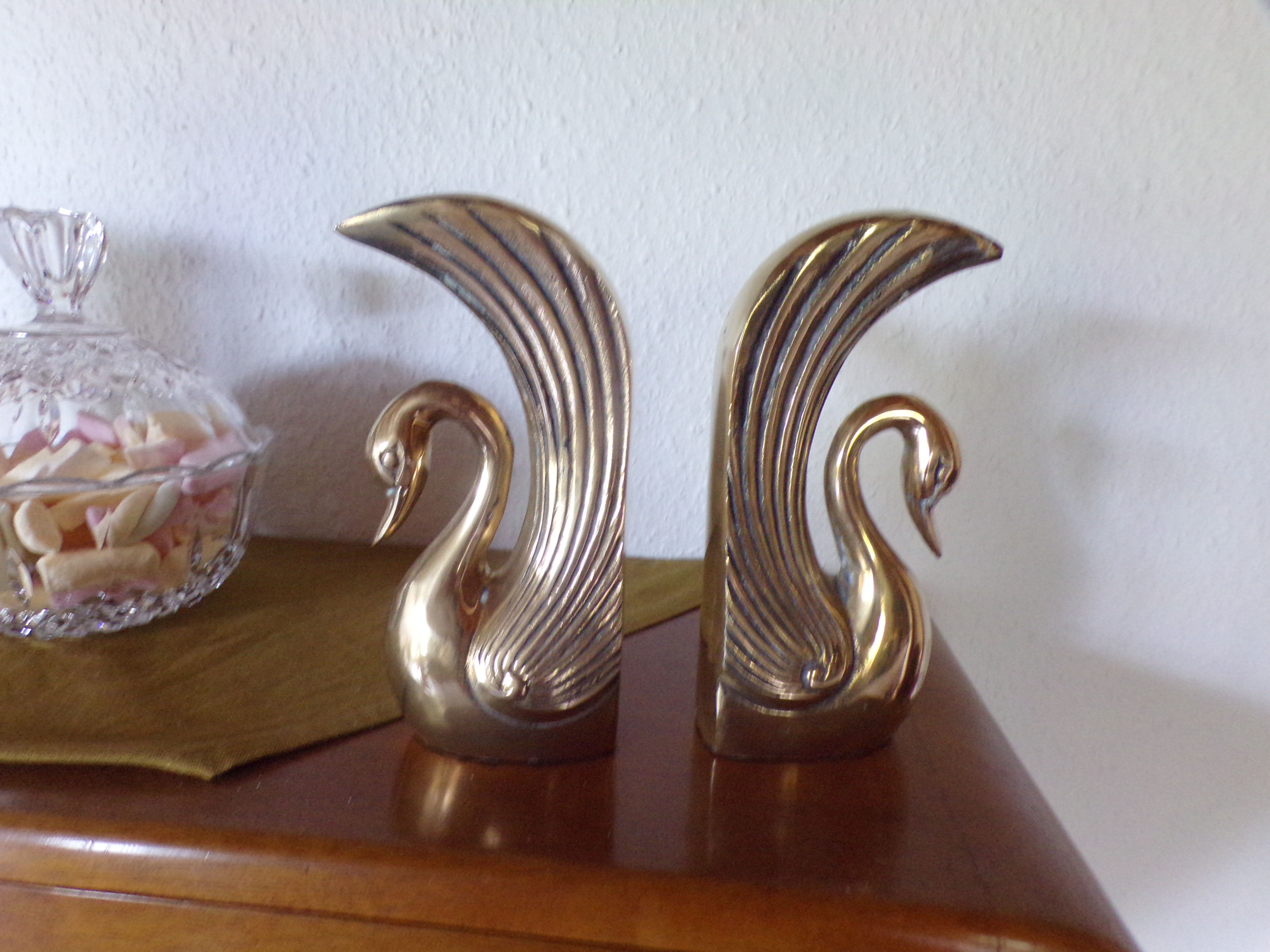 Pair of greenhouse books brass swans