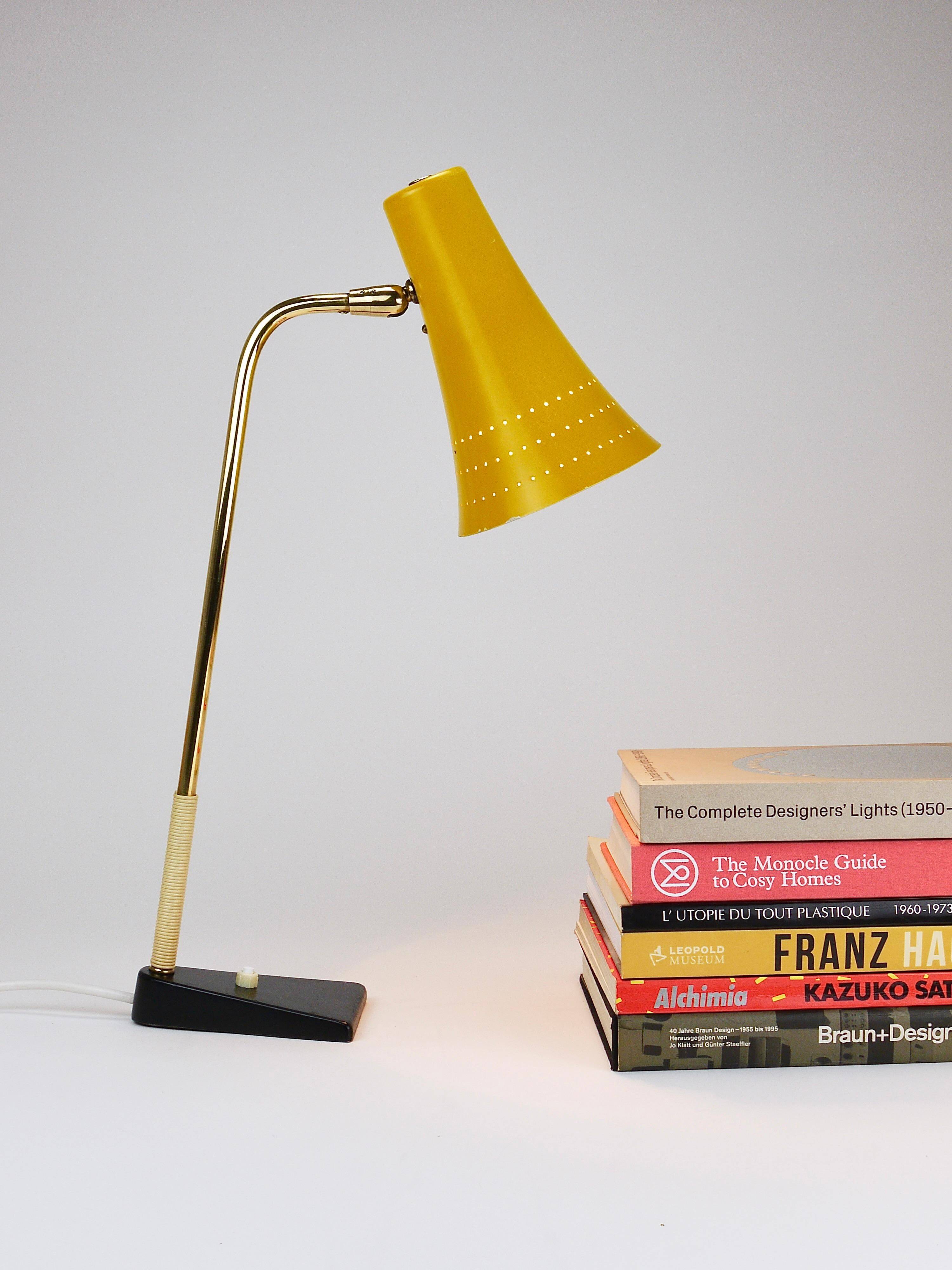 Yellow desk, table or accent lamp by J.T. Kalmar, brass and iron, Vienna, Austria, 1950s.