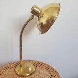 Golden hinged desk lamp