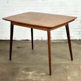 Extendable vintage dining table in teak wood