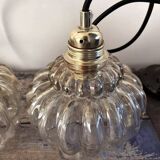 Set of two amber glass pendant lights