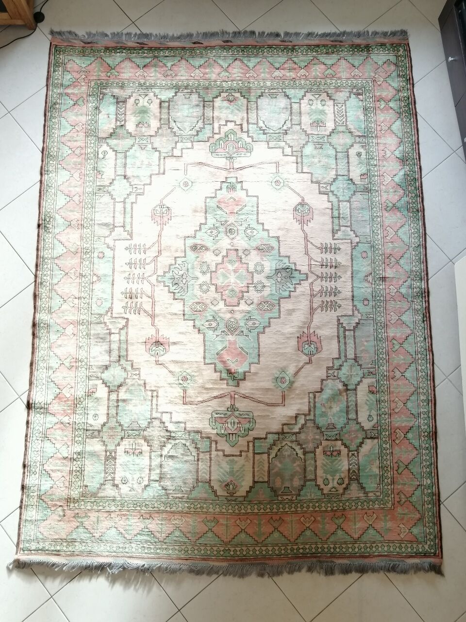 Afghan rug in pastel colors
