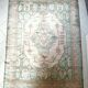 Afghan rug in pastel colors