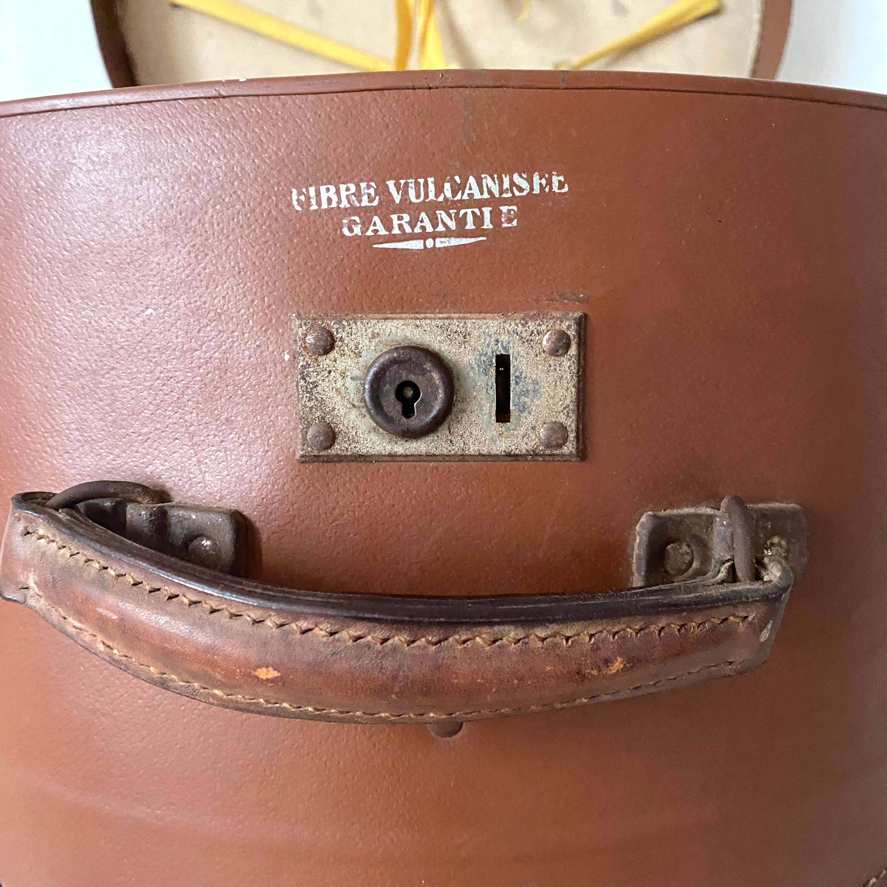 Old hat box and its key from the 1930s