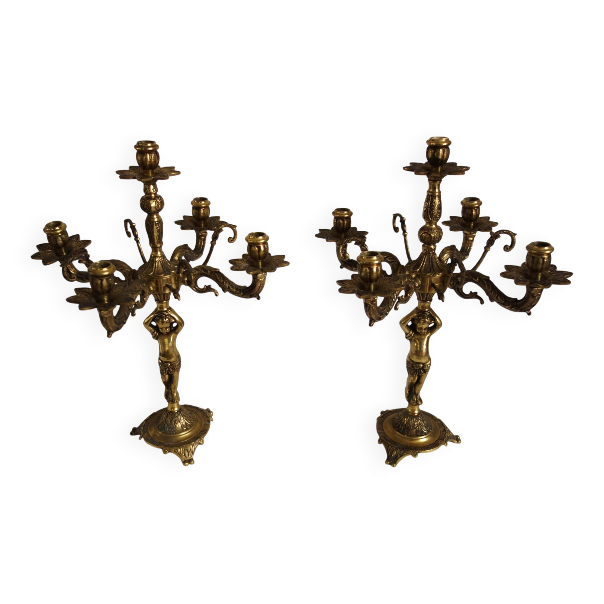 Pair of cherub candle holders in gilded bronze, early 20th century.