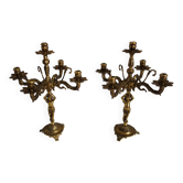 Paire de chandeliers chérubins en bronze doré début xxème