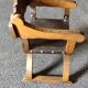 Armchair called Dagobert in wood and leather