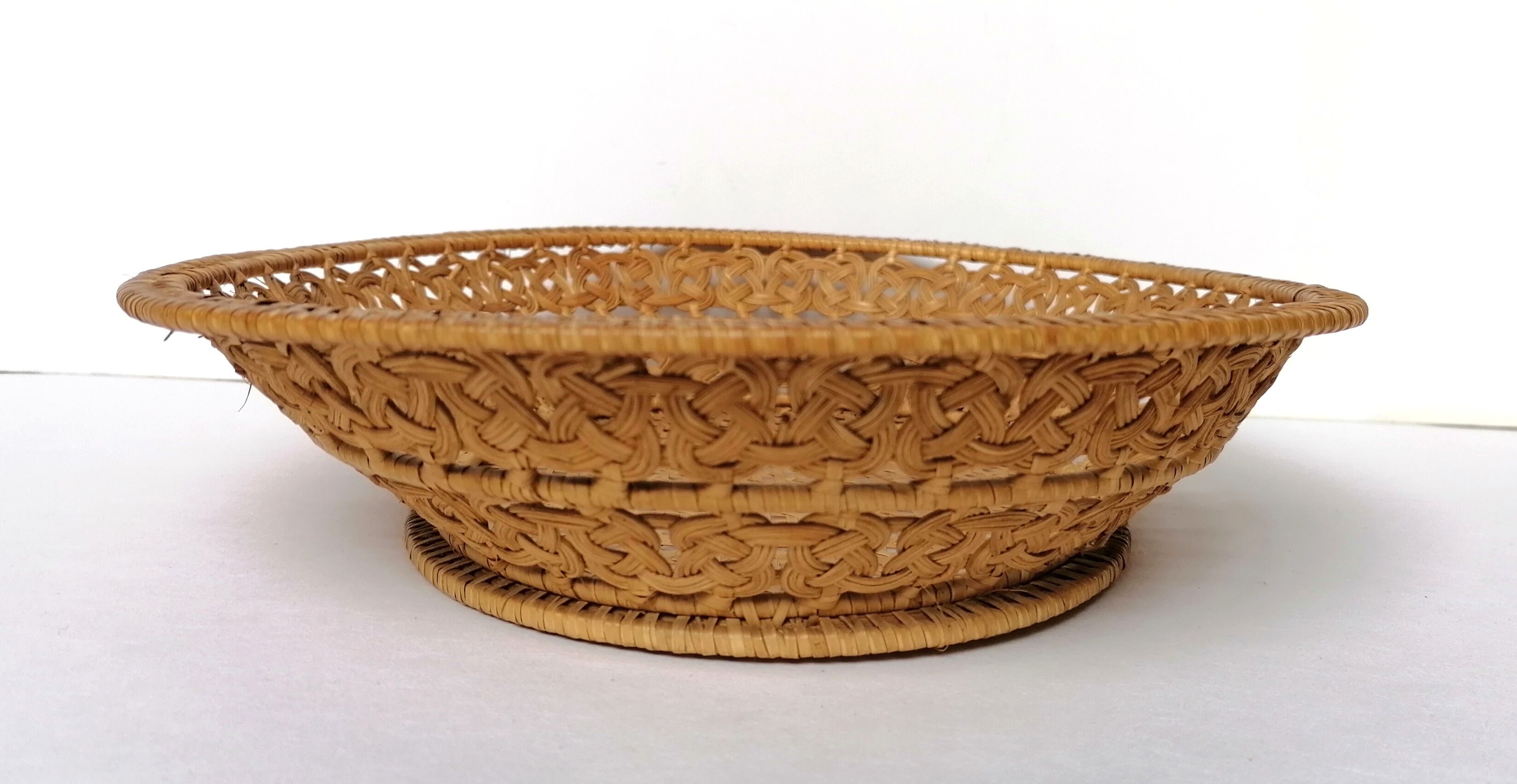 Old basket braided in rattan
