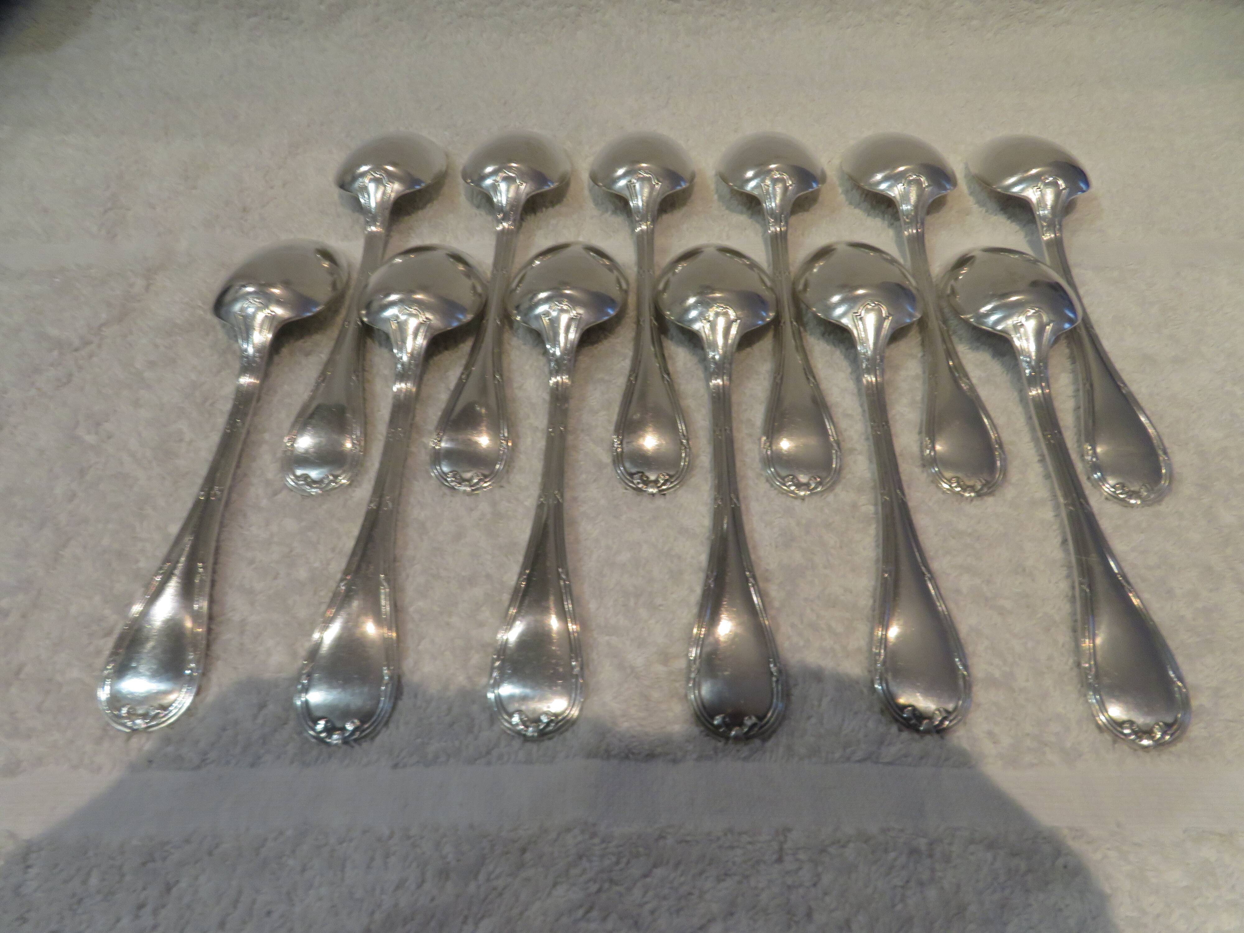 12 silver plated soup spoons by Christofle with Louis XVI ribbons
