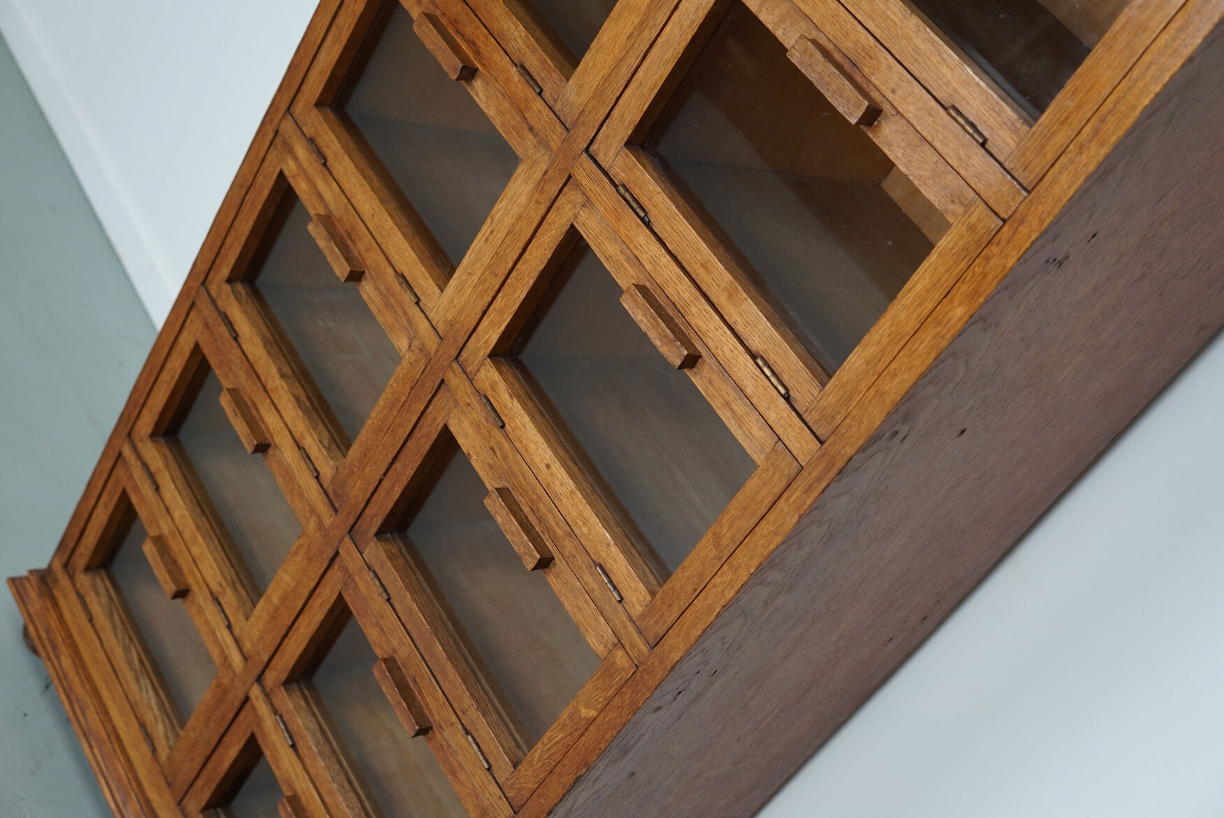 Vintage dutch oak haberdashery shop cabinet / vitrine drop down doors, 1930s