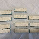 11 ceramic knife holders signed Jean Garillon