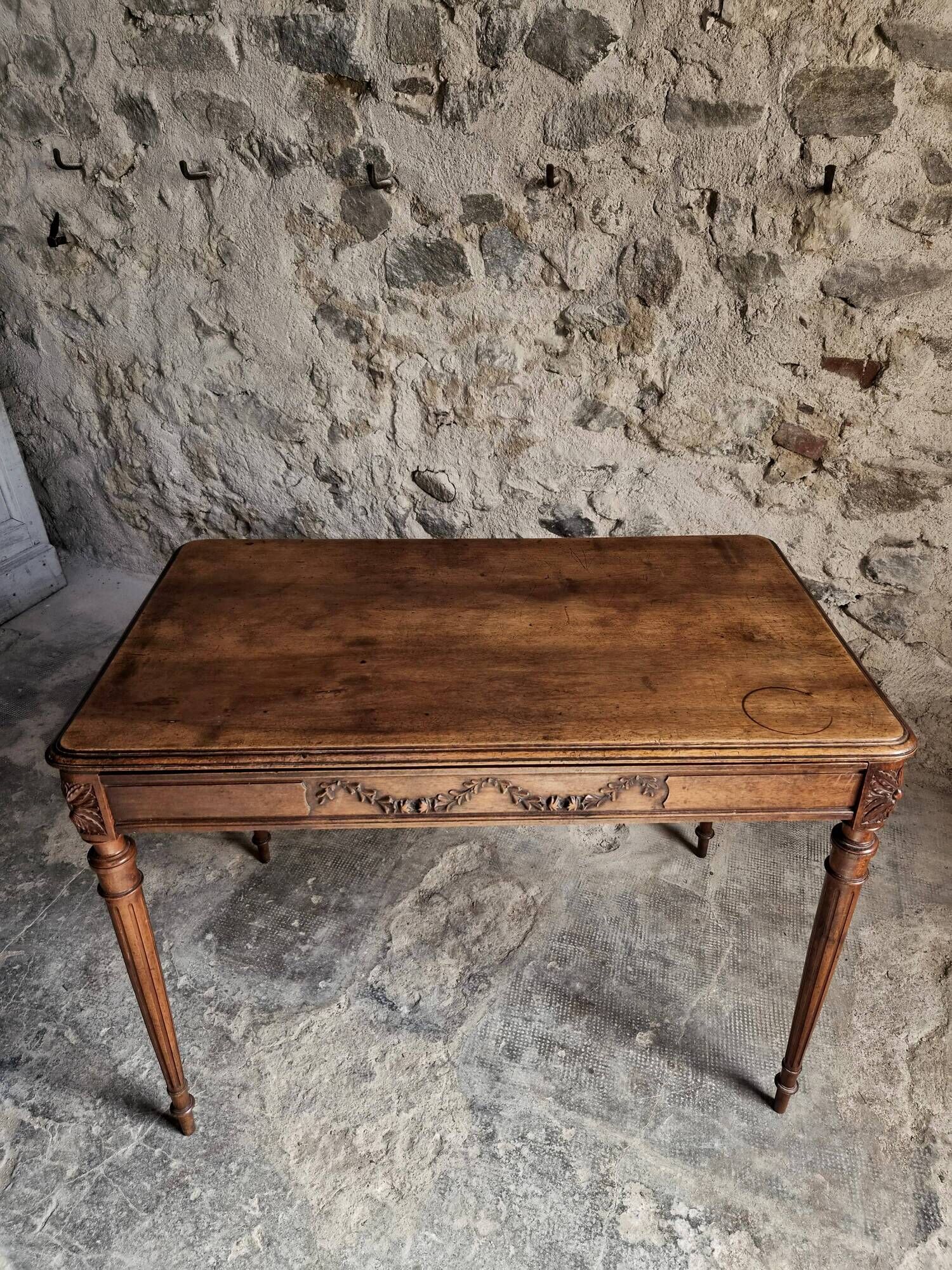 French antique writing desk in walnut, Louis XVI style, late 19th century, circa 1880–1900.