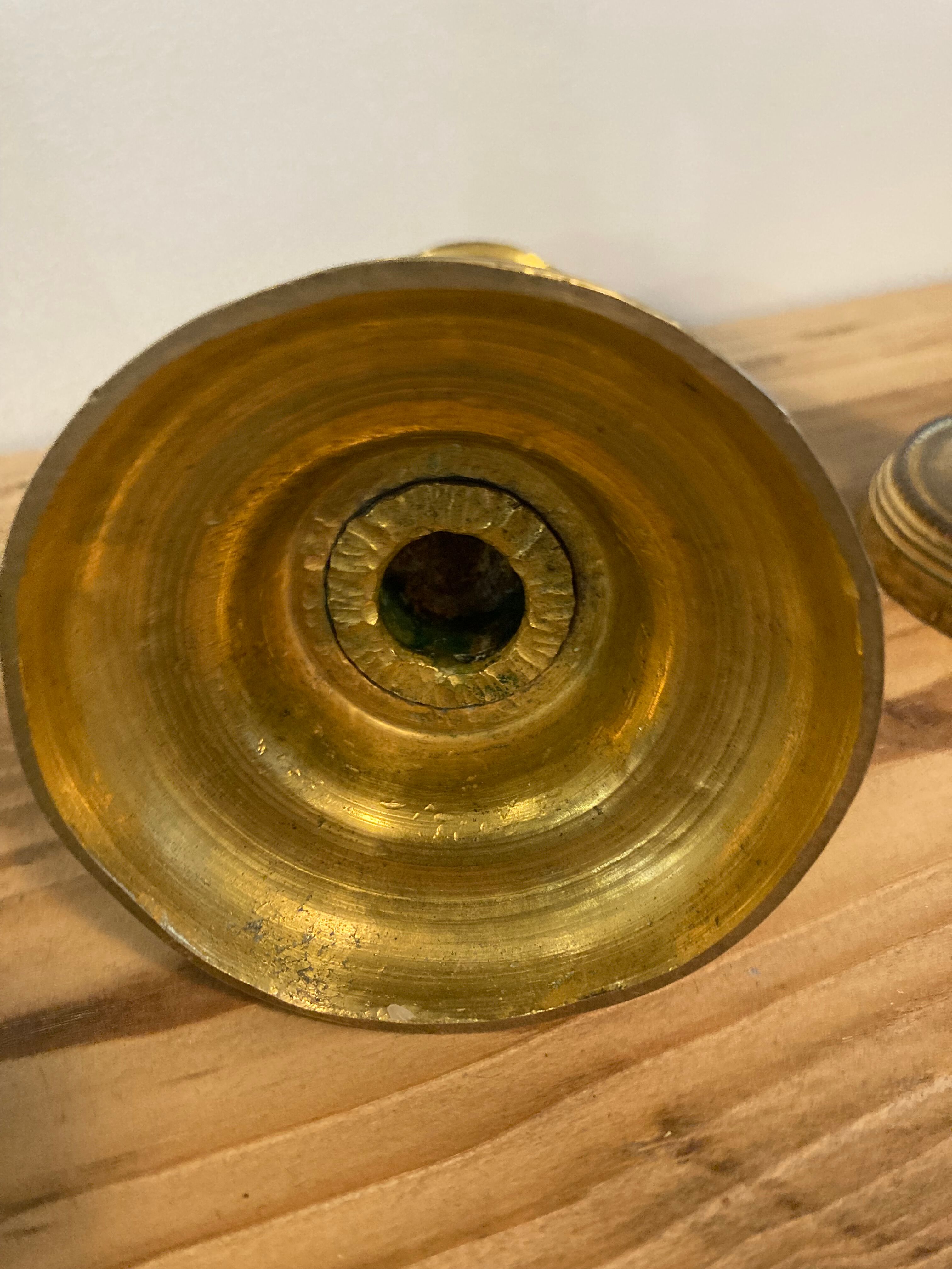 Pair of Louis XVI candlesticks in gilded bronze