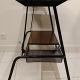 Red scoubidou handles wheeled serving table