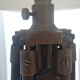 Classic lampshade on antique surveyor tripod