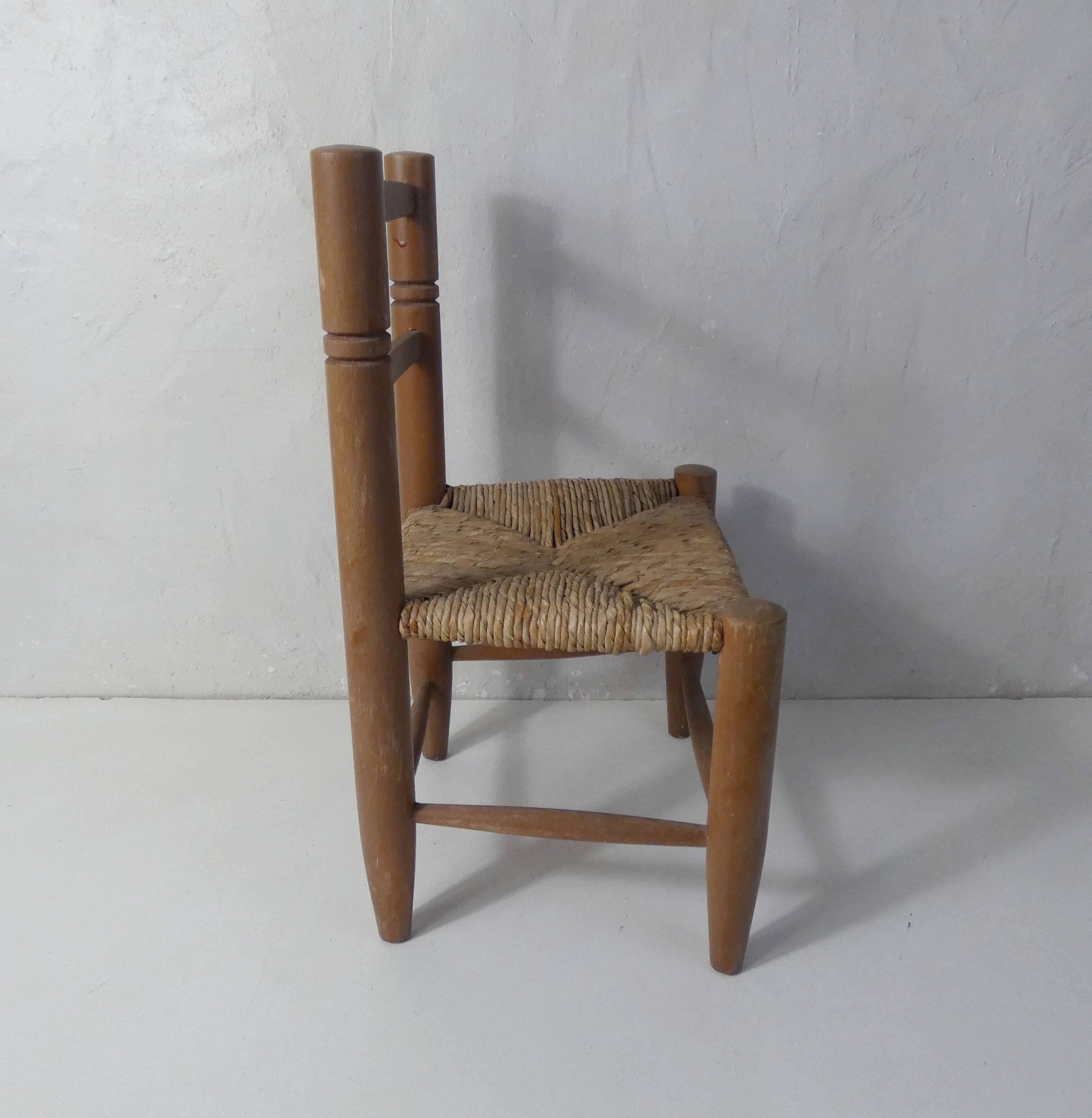 Old wooden straw chair for children