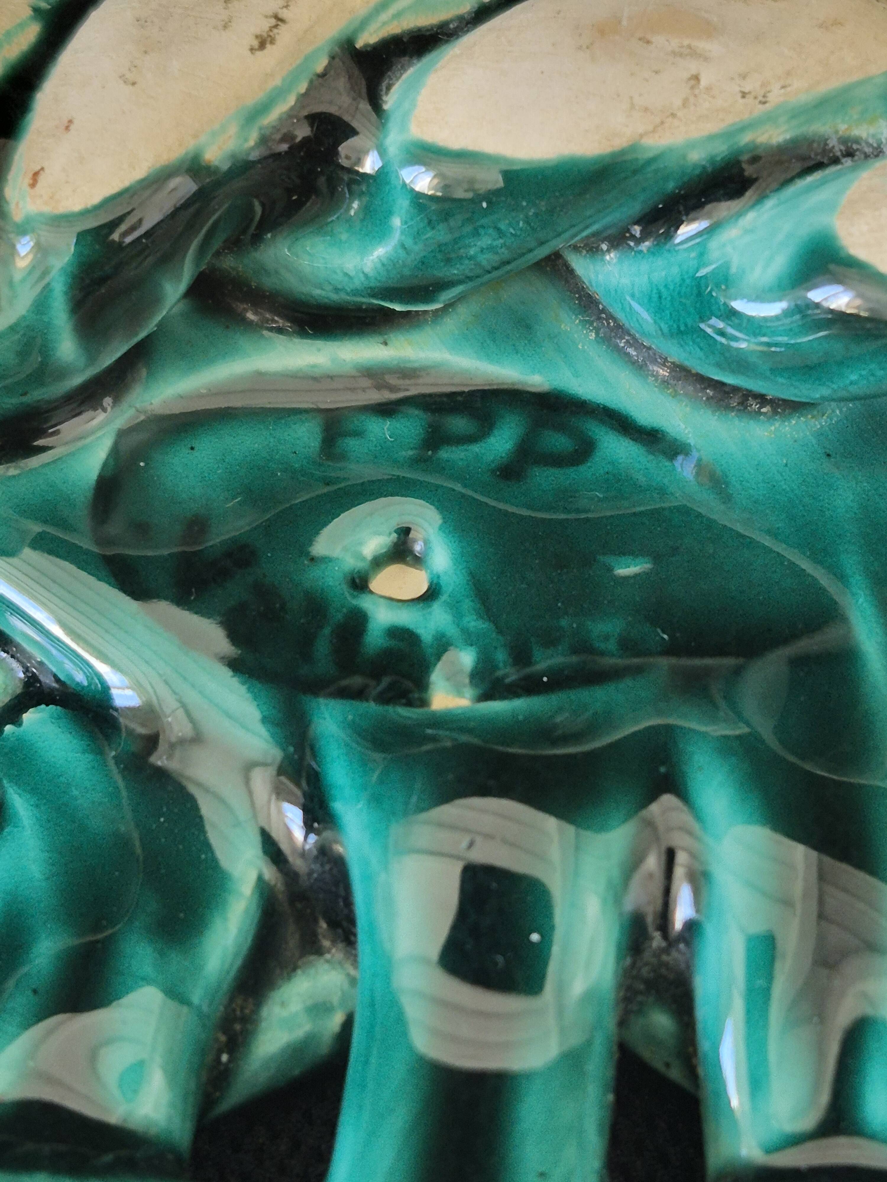 Varnished ceramic trivet from Vallauris and 2 bottle coasters.