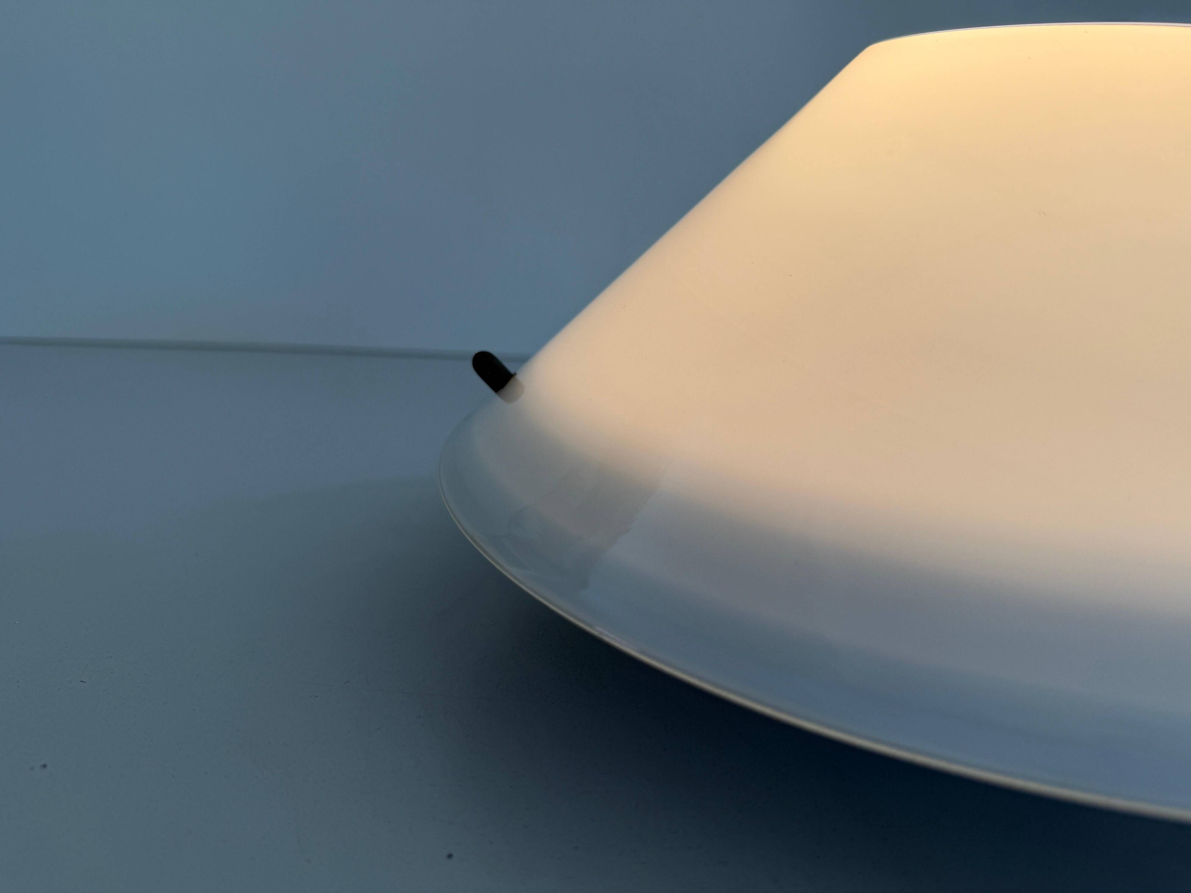 Simple opal glass wall light from the mid-century by Lamperti, 1960s, Italy.