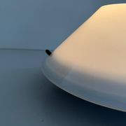 Simple opal glass wall light from the mid-century by Lamperti, 1960s, Italy.