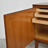 Row 3 doors clear teak, 1960