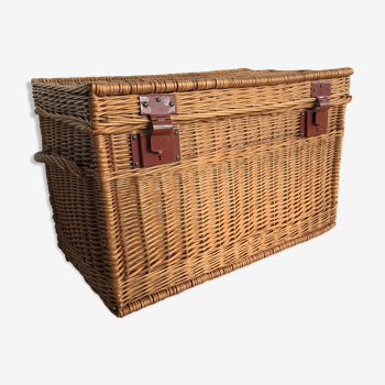 Vintage wicker trunk with burgundy metal closures