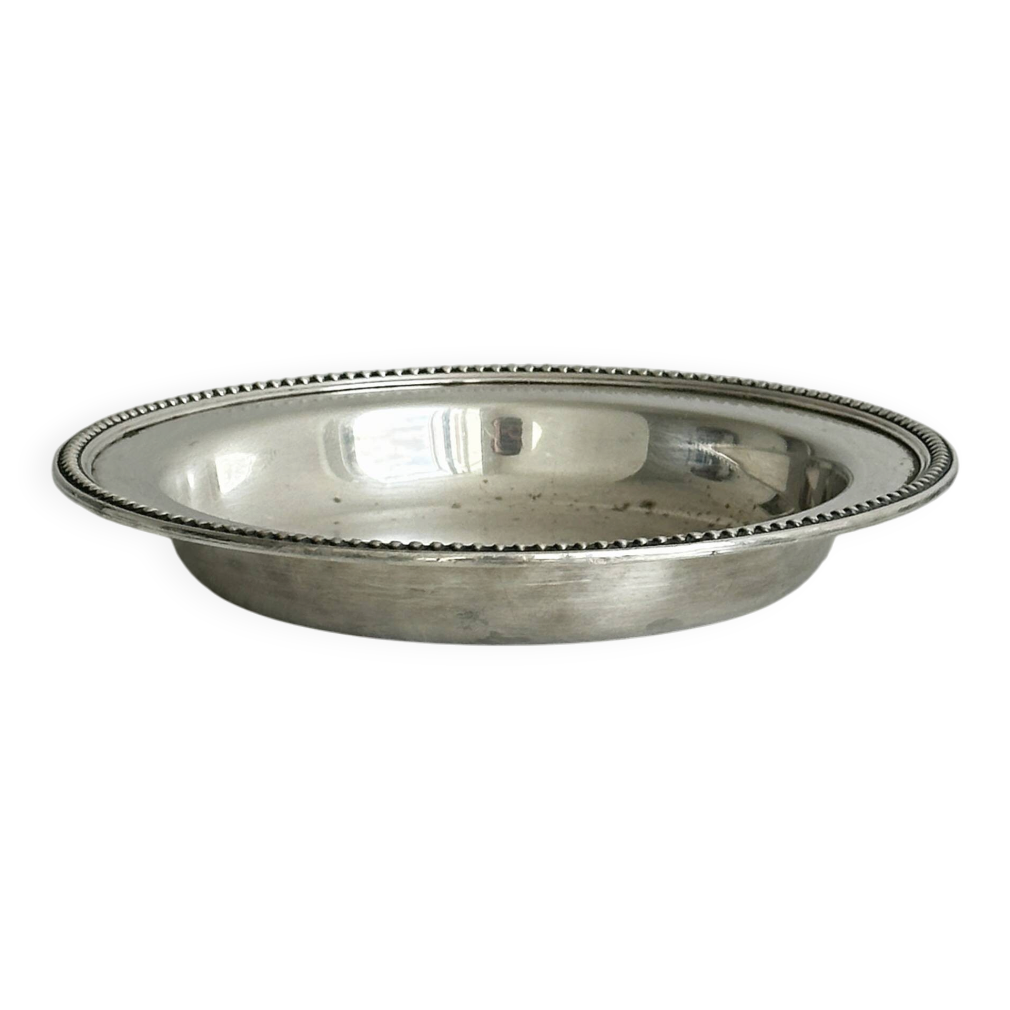 Round patinated silver-plated metal dish