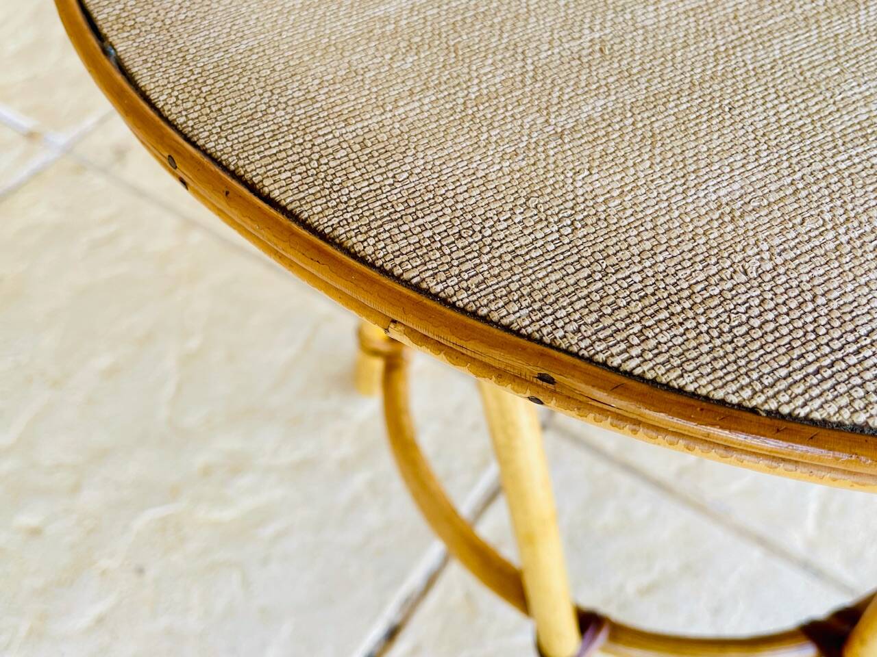Vintage rattan and bamboo side table, circa 1969.
