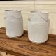 SET OF 2 LARGE METAL CANDLE HOLDERS IN SCANDINAVIAN DESIGN.