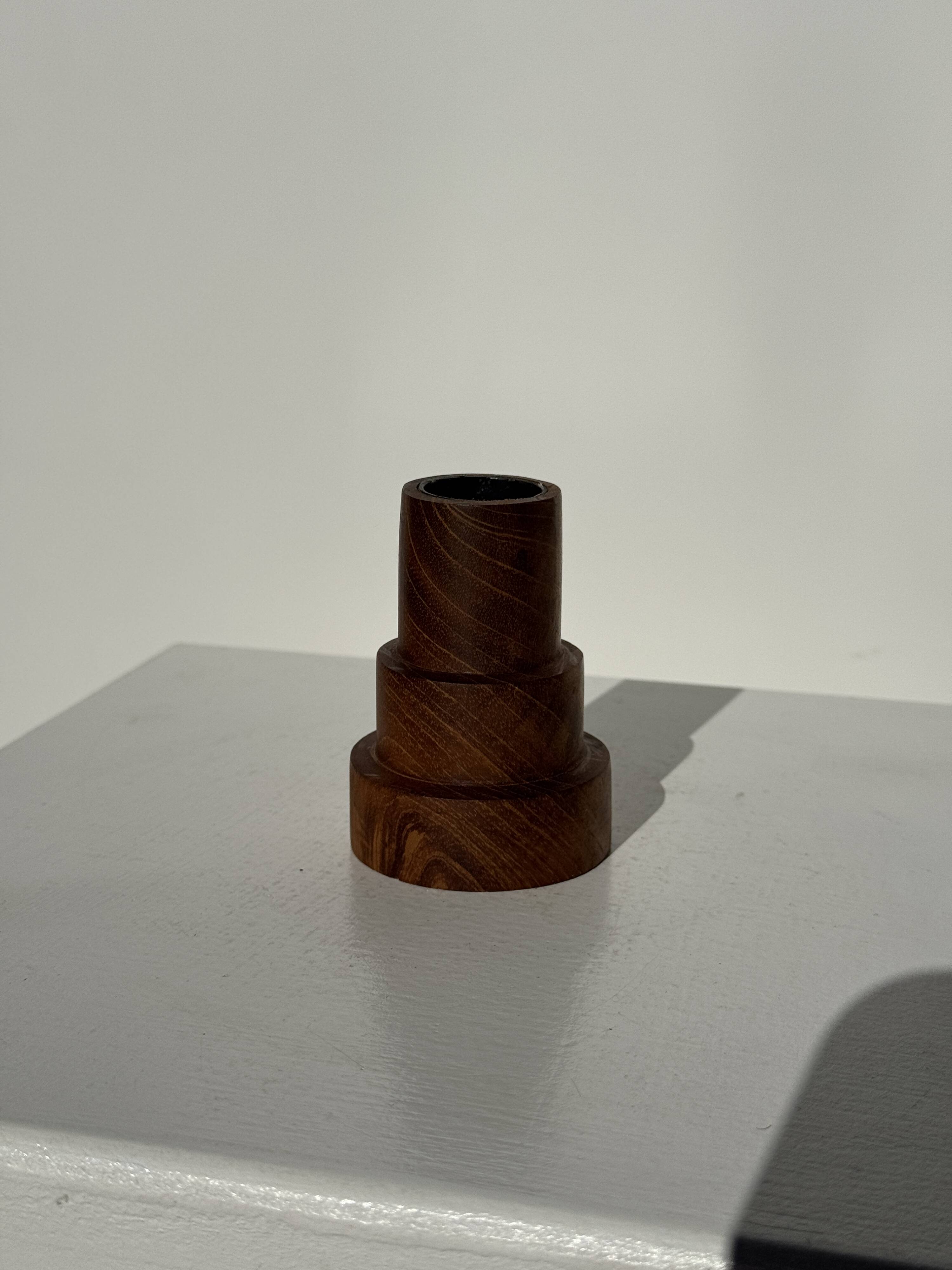 Pyramidal circular teak monoxyle candlestick H7 D5