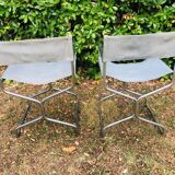 Pair of folding metal and leather armchairs