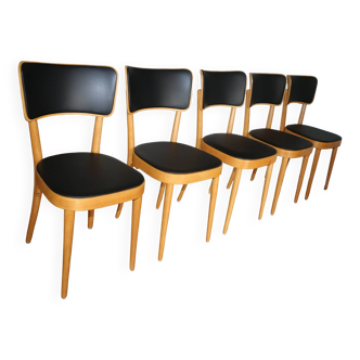 5 baumann chairs with large backs in black faux leather.