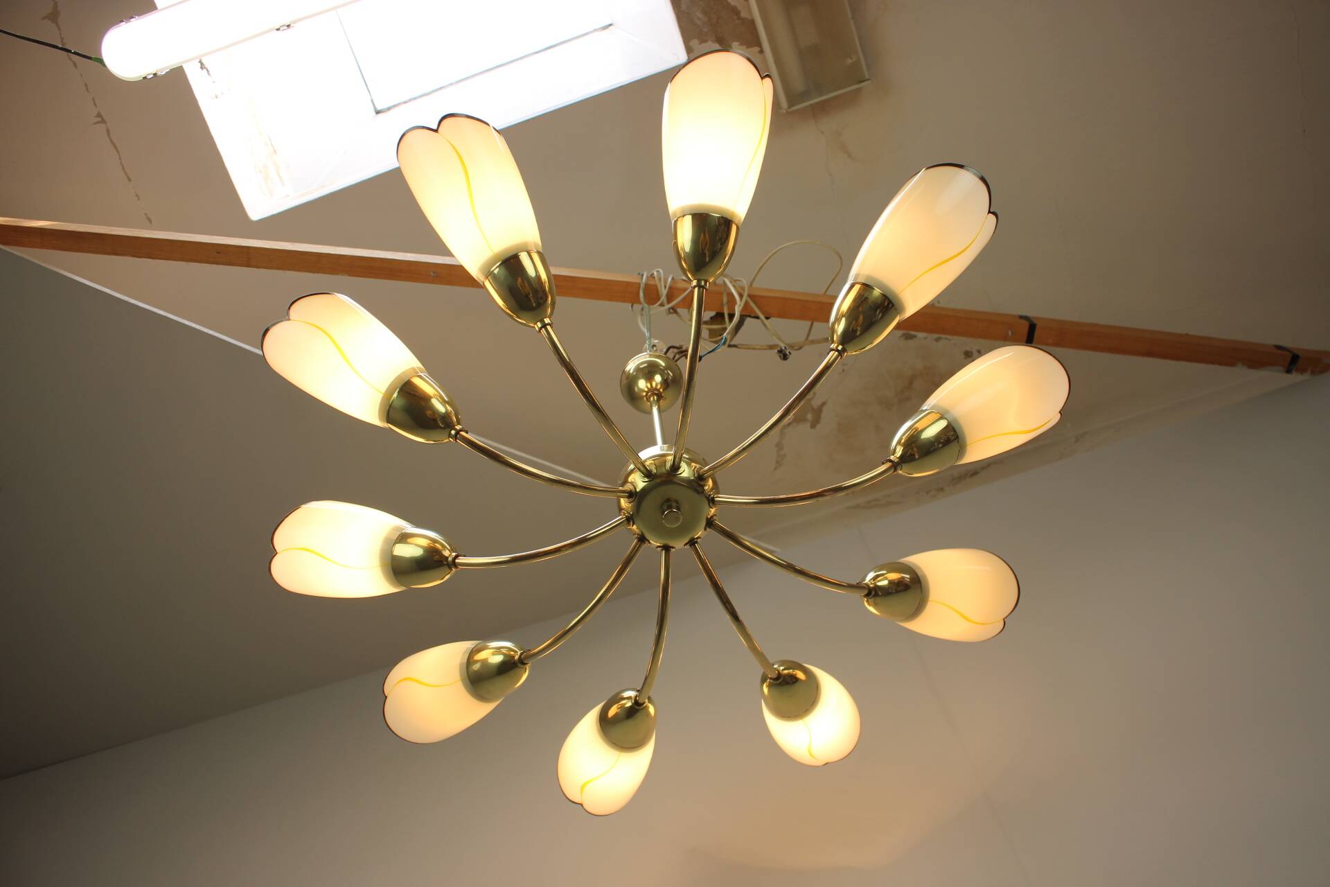 Brass and glass ten-arm chandelier from the mid-century, 1960s.
