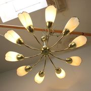 Brass and glass ten-arm chandelier from the mid-century, 1960s.