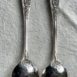 Set of 12 small silver-plated metal spoons in Art Nouveau style.